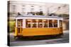 Europe, Portugal, Lisbon, a Speeding Tram (Streetcar) in the City Center-Alex Robinson-Stretched Canvas