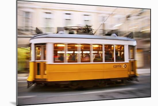 Europe, Portugal, Lisbon, a Speeding Tram (Streetcar) in the City Center-Alex Robinson-Mounted Photographic Print