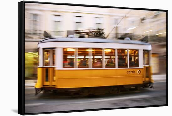 Europe, Portugal, Lisbon, a Speeding Tram (Streetcar) in the City Center-Alex Robinson-Framed Stretched Canvas