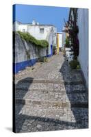 Europe, Portugal, Obidos, Cobblestone Street-Lisa S. Engelbrecht-Stretched Canvas