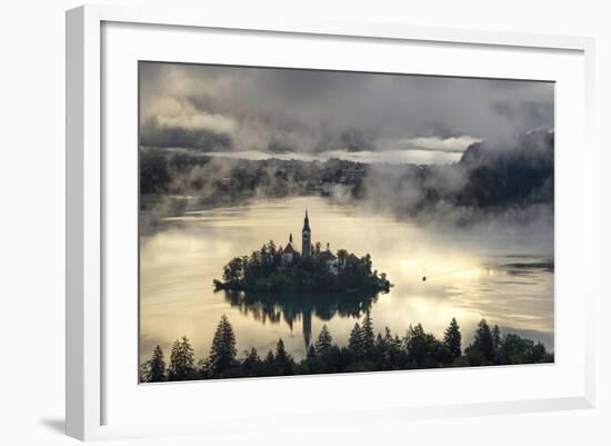 Europe, Slovenia, Bled - A Pletna Boat Arriving At The Island Of Lake Bled During A Foggy Sunrise-Aliaume Chapelle-Framed Photographic Print