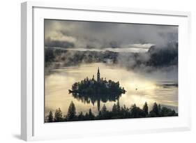 Europe, Slovenia, Bled - A Pletna Boat Arriving At The Island Of Lake Bled During A Foggy Sunrise-Aliaume Chapelle-Framed Photographic Print