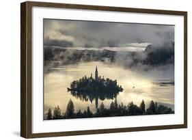 Europe, Slovenia, Bled - A Pletna Boat Arriving At The Island Of Lake Bled During A Foggy Sunrise-Aliaume Chapelle-Framed Photographic Print