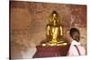 European Tourist Looking at Golden Buddha Statue in Bagan, Myanmar-Harry Marx-Stretched Canvas