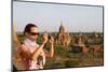 European Tourist Taking Pictures of Sunset at Temples of Bagan, Myanmar-Harry Marx-Mounted Photographic Print