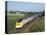 Eurostar Train Travelling Through Countryside-John Miller-Stretched Canvas