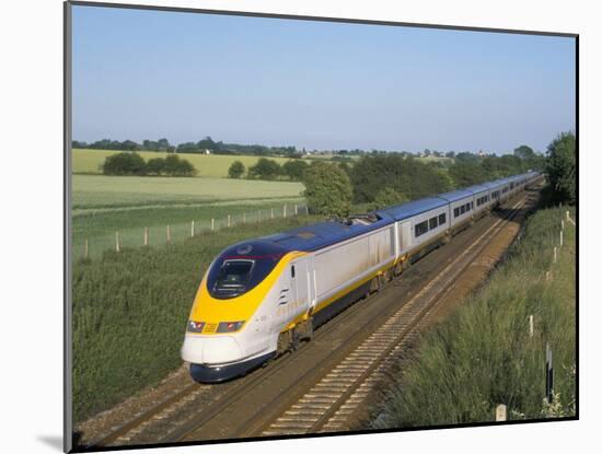 Eurostar Train Travelling Through Countryside-John Miller-Mounted Photographic Print