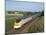 Eurostar Train Travelling Through Countryside-John Miller-Mounted Photographic Print