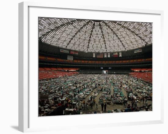 Evacuees from New Orleans Cover the Floor of Houston's Astrodome Saturday-null-Framed Photographic Print