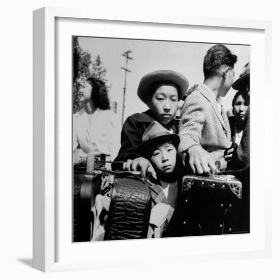 Evacuees of Japan Awaiting Turn for Baggage Inspection upon Arrival at Assembly Center During WWII-Dorothea Lange-Framed Photographic Print