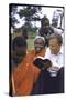 Evangelist Billy Graham Showing His Bible to the Waarusha Warriors Near Mt. Meru-James Burke-Stretched Canvas