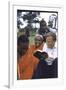 Evangelist Billy Graham Showing His Bible to the Waarusha Warriors Near Mt. Meru-James Burke-Framed Photographic Print