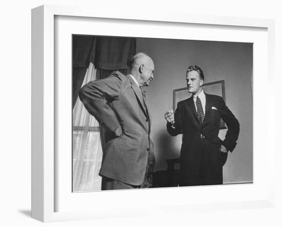 Evangelist Billy Graham Visiting with Pres. Dwight Eisenhower at the Wh-Paul Schutzer-Framed Photographic Print