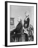 Evard Grieg Playing Piano with Wife Looking On-null-Framed Photographic Print