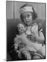 Evelyn Mott playing Nurse with doll as parents adjust children to abnormal conditions in wartime-Alfred Eisenstaedt-Mounted Photographic Print