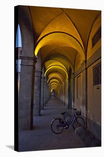 Evening and Lighted Arched Hallway, Lucca, Italy-Terry Eggers-Stretched Canvas