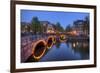 Evening Light Old Buildings and Bridge Along the Many Canals of Amsterdam, Netherlands-Darrell Gulin-Framed Photographic Print