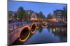 Evening Light Old Buildings and Bridge Along the Many Canals of Amsterdam, Netherlands-Darrell Gulin-Mounted Photographic Print