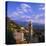 Evening View Across Rooftops and Church Tower to Mountains, Lumio, Near Calvi, Corsica, France-Ruth Tomlinson-Stretched Canvas