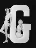 Two Young Women Posing with the Letter T-Everett Collection-Photographic Print