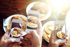 Friends Using Smartphones to Take Photos of Food with Instagram Style Filter-evren_photos-Photographic Print