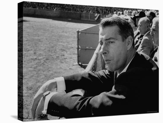 Ex Yankee Baseball Player Joe DiMaggio, Leaning over Rail Watching 3rd Game of the World Series-Grey Villet-Stretched Canvas