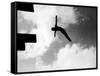 Excellent of Man Silhouetted Against Sky Doing Back Dive Off High Board-Rex Hardy Jr.-Framed Stretched Canvas