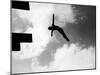 Excellent of Man Silhouetted Against Sky Doing Back Dive Off High Board-Rex Hardy Jr.-Mounted Photographic Print