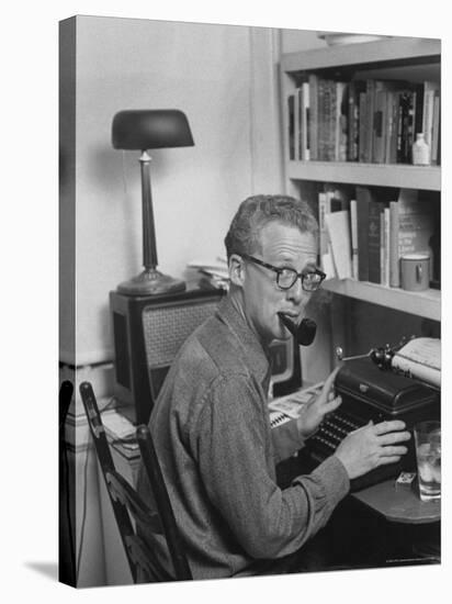 Excellent of Pulitzer Prize Winning Journalist Murray Kempton Smoking Pipe at Typewriter-Martha Holmes-Stretched Canvas