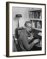 Excellent of Pulitzer Prize Winning Journalist Murray Kempton Smoking Pipe at Typewriter-Martha Holmes-Framed Premium Photographic Print