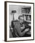 Excellent of Pulitzer Prize Winning Journalist Murray Kempton Smoking Pipe at Typewriter-Martha Holmes-Framed Premium Photographic Print