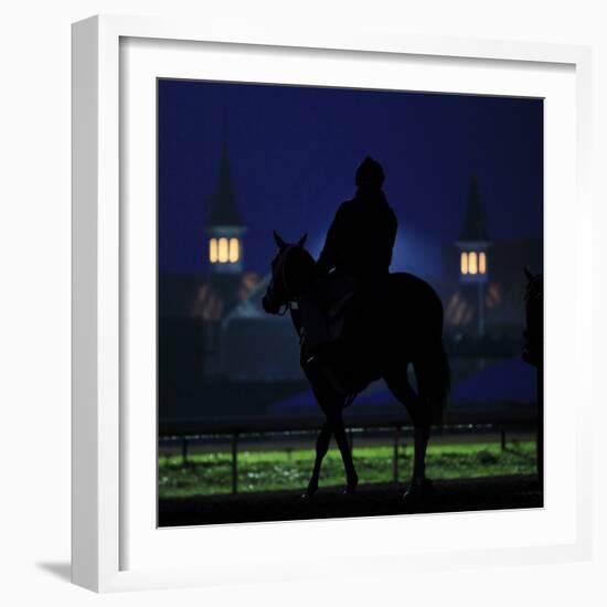 Excercise Rider Makes His Way to the Track for an Early Morning Workout at Churchill Downs-null-Framed Photographic Print