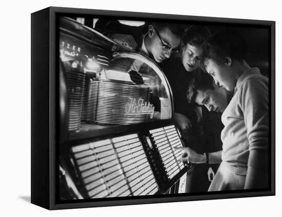 Exchange Student Stephen Lapekas Playing a Song on a Juke Box-null-Framed Stretched Canvas