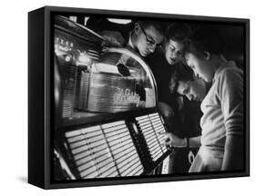 Exchange Student Stephen Lapekas Playing a Song on a Juke Box-null-Framed Stretched Canvas