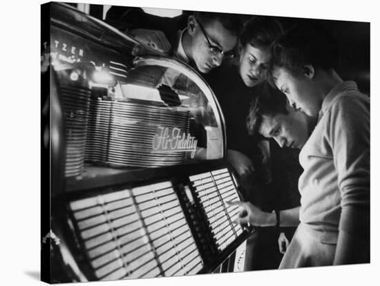 Exchange Student Stephen Lapekas Playing a Song on a Juke Box-null-Stretched Canvas