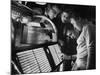 Exchange Student Stephen Lapekas Playing a Song on a Juke Box-null-Mounted Photographic Print