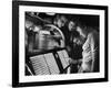 Exchange Student Stephen Lapekas Playing a Song on a Juke Box-null-Framed Photographic Print