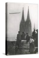 Excited Spectators Watching a Zeppelin Z111 Fly Over Cologne Cathedral Germany-null-Stretched Canvas