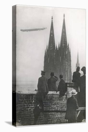 Excited Spectators Watching a Zeppelin Z111 Fly Over Cologne Cathedral Germany-null-Stretched Canvas