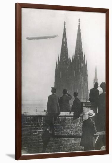 Excited Spectators Watching a Zeppelin Z111 Fly Over Cologne Cathedral Germany-null-Framed Photographic Print