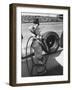 Expert Mechanic Waiting for a Car to Stop During the Daytona 500 Autorace-null-Framed Photographic Print