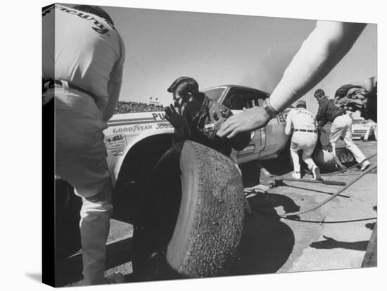 Expert Mechanics Making Repairs on a Car During the Daytona 500 Race-null-Stretched Canvas