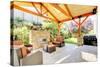 Exterior Covered Patio with Fireplace and Furniture-Iriana Shiyan-Stretched Canvas