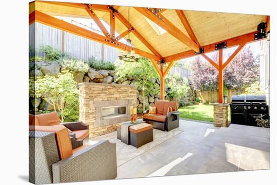 Exterior Covered Patio with Fireplace and Furniture-Iriana Shiyan-Stretched Canvas