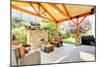 Exterior Covered Patio with Fireplace and Furniture-Iriana Shiyan-Mounted Photographic Print