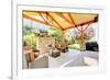 Exterior Covered Patio with Fireplace and Furniture-Iriana Shiyan-Framed Photographic Print