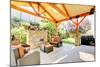 Exterior Covered Patio with Fireplace and Furniture-Iriana Shiyan-Mounted Photographic Print