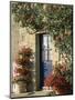 Exterior of a Blue Door Surrounded by Red Flowers, Roses and Geraniums, St. Cado, Brittany, France-Ruth Tomlinson-Mounted Photographic Print