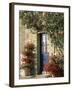 Exterior of a Blue Door Surrounded by Red Flowers, Roses and Geraniums, St. Cado, Brittany, France-Ruth Tomlinson-Framed Photographic Print