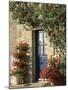 Exterior of a Blue Door Surrounded by Red Flowers, Roses and Geraniums, St. Cado, Brittany, France-Ruth Tomlinson-Mounted Photographic Print